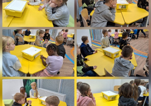 Uczniowie klasy 1a podczas warsztatów robotycznych "Projektujemy komPAKTowego robota".